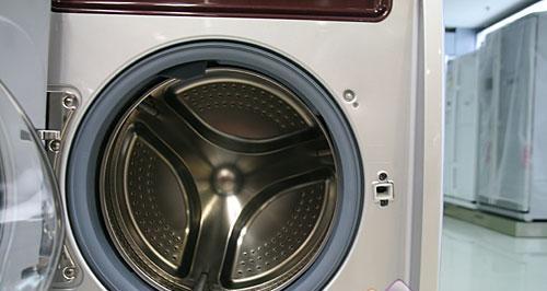 解决全自动洗衣机异味的方法（保持洗衣机清洁与消除异味的关键技巧）